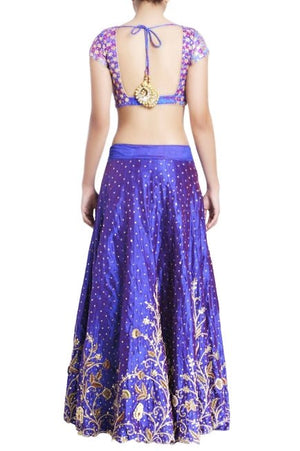 Buy blue & purple raw silk embroidered lehenga online in USA with white net dupatta. Grab those eyeballs at special occasions with an exclusive range of Indian dresses, designer lehengas from Pure Elegance Indian fashion store in USA or shop online.-back