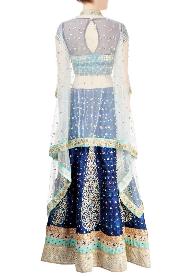 Buy captivating indigo raw silk hand embroidery lehenga with cape online in USA. Grab those eyeballs at special occasions with an exclusive range of Indian dresses, designer lehengas from Pure Elegance Indian fashion store in USA or shop online.-back
