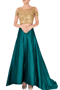 Shop green train lehenga with embroidered cold shoulder blouse online in USA. Grab those eyeballs at special occasions with an exclusive range of Indian dresses, designer lehengas from Pure Elegance Indian fashion store in USA or shop online.-full view
