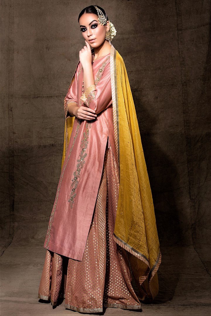 Buy ethnic old rose chanderi kurta skirt set with dupatta online in USA. Shine with rich ethnic outfits at weddings and special occasions from Pure Elegance clothing store in USA. A beautiful collection of Indian designer dresses, wedding lehengas, wedding sarees, and much more is waiting for you on online and in our store.-side view