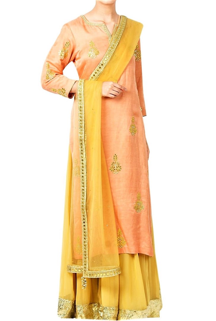 Buy peach gota patti embroidery kurta with gold color skirt online in USA. Shine with rich ethnic outfits at weddings and special occasions from Pure Elegance clothing store in USA. A beautiful collection of Indian designer dresses, wedding lehengas, party dresses, and much more is waiting for you on online and in our store.-full view