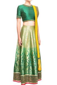Buy ombre green Banarasi lehenga online in USA with yellow dupatta. Bring a rich traditional touch to your bridal look with beautiful Indian designer lehengas from Pure Elegance clothing store. We have a range of wedding lehengas, designer sarees, bridal saris in USA online and in our store. Shop now. -full view
