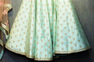 Buy sea green embroidered chanderi silk lehenga with choli online in USA. It comes with a matching dupatta. Find more such exquisite designer lehengas at Pure Elegance online store. You can visit at our exclusive Indian fashion store in USA and shop from a range of beautiful Indian lehengas, wedding dresses, Anarkalis and much more.-lehenga