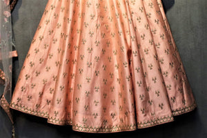Buy salmon pink gota patti chanderi silk lehenga with choli online in USA. It comes with a matching dupatta. Find more such exquisite designer lehengas at Pure Elegance online store. You can visit at our exclusive Indian fashion store in USA and shop from a range of beautiful Indian lehengas, wedding dresses, Anarkalis and much more.-lehenga