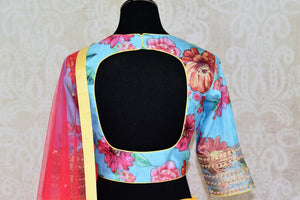 Buy yellow pink striped silk lehenga with blue floral print blouse online in USA and dupatta. Find a range of stunning designer lehengas in USA at Pure Elegance Indian clothing store. Elevate your traditional style with a range of designer saris, Indian clothing, and much more also available at our online store.-blouse back