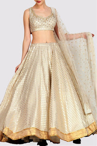Shop off-white foil print lehenga online in USA with mukesh net dupatta. For more such gorgeous designer lehengas, shop at Pure Elegance Indian fashion store in USA. A beautiful range of traditional sarees and clothing is available for Indian women living in USA. You can also shop at our online store.-full view