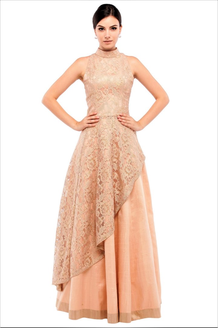 Buy toasted almond lace asymmetric top with silk skirt online in USA at Pure Elegance online store. Get a gorgeous ethnic look with a range of exquisite Indian designer lehengas from our clothing store in USA. We also bring the best Indian dresses for brides in USA under one roof. Shop now.-full view