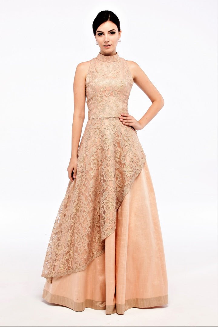 Buy toasted almond lace asymmetric top with silk skirt online in USA at Pure Elegance online store. Get a gorgeous ethnic look with a range of exquisite Indian designer lehengas from our clothing store in USA. We also bring the best Indian dresses for brides in USA under one roof. Shop now.-front