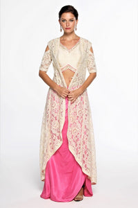 Buy designer pink draped skirt with white lace jacket online in USA at Pure Elegance online store. Get a gorgeous ethnic look with a range of exquisite Indian designer dresses from our clothing store in USA. We also bring the best Indian dresses for brides in USA under one roof. Shop now.-full view