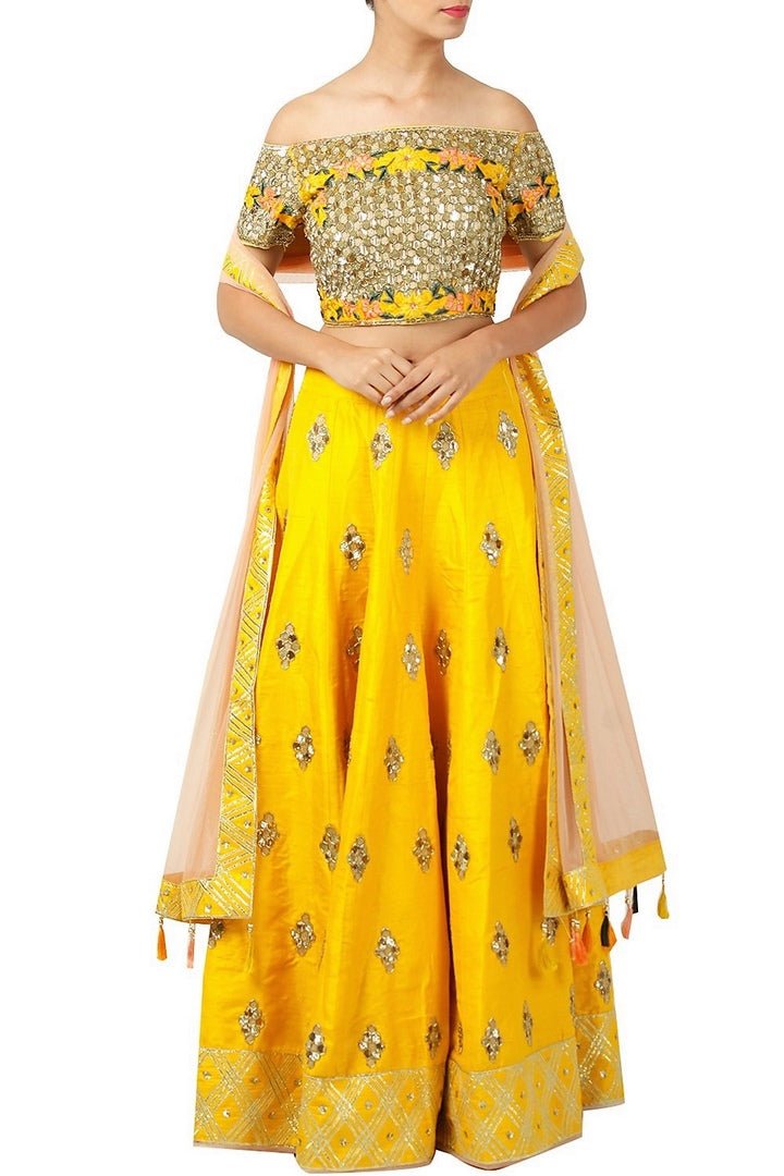 Buy designer mango yellow gota work lehenga online in USA. Find a range of Indian wedding dresses for brides at Pure Elegance clothing store in USA. Keep your ethnic look perfect with a range of traditional Indian clothing, designer silk saris, wedding saris and much more also available at our online store.-full view