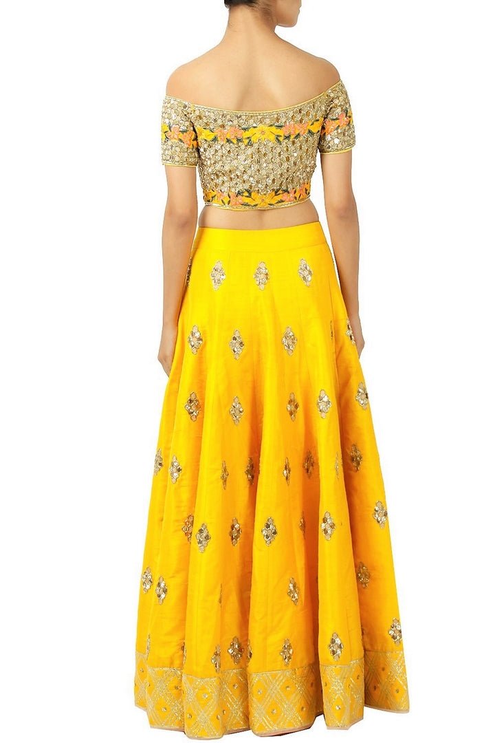 Buy designer mango yellow gota work lehenga online in USA. Find a range of Indian wedding dresses for brides at Pure Elegance clothing store in USA. Keep your ethnic look perfect with a range of traditional Indian clothing, designer silk saris, wedding saris and much more also available at our online store.-back