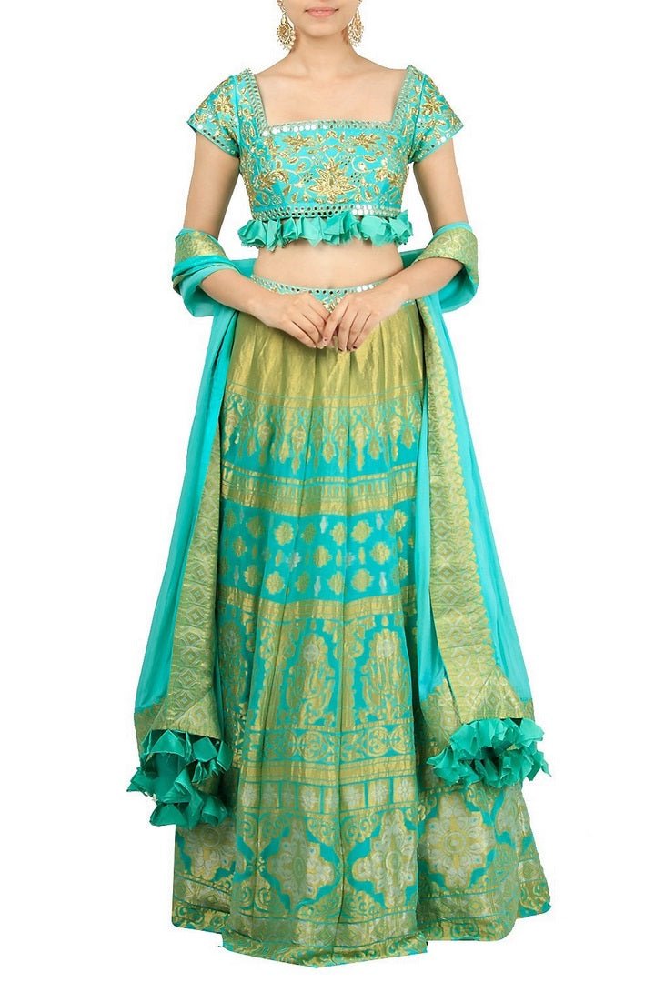 Buy blue embroidered lehenga skirt with blouse and dupatta online in USA. Find a range of Indian wedding dresses for brides at Pure Elegance clothing store in USA. Keep your ethnic look perfect with a range of traditional Indian clothing, designer silk saris, wedding saris and much more also available at our online store. -full view