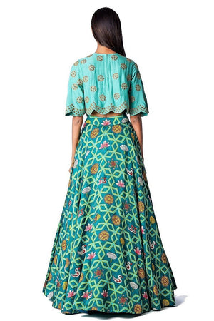 Shop designer dark teal jaal lehenga with danka top online in USA. Find a range of stunning designer dresses by Swati Vijayvargie in USA at Pure Elegance Indian clothing store. Elevate your traditional style with a range of designer silk sarees, Indian clothing, and much more also available at our online store.-back