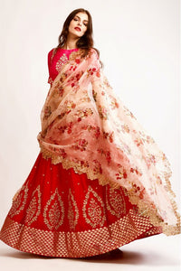 Shop red embroidered chanderi lehenga with pink raw silk zardozi work blouse online in USA and organza dupatta. You can find a fine collection of Indian designer lehengas in USA at Pure Elegance clothing store. Our range of traditional Indian clothing, designer silk saris, wedding sarees, wedding dresses is sure to leave you awestruck. -full view