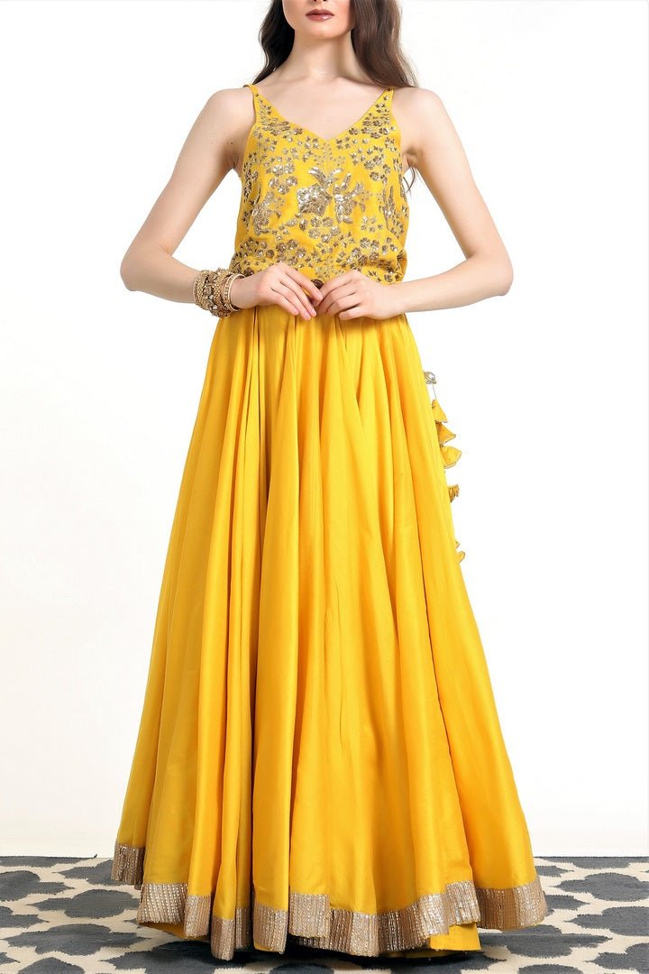 Buy sunshine yellow blended silk top with lehenga skirt online in USA. Get wedding ready with a stunning range of Indian designer lehengas from Pure Elegance fashion store in USA. Shop from a collection of silk saris, wedding sarees, and Indian clothing for a gorgeous ethnic look from our online store.-full view