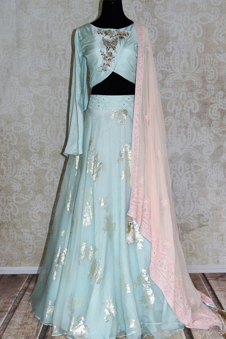Buy pastel blue organza lehenga with chikankari dupatta online in USA. Make your ethnic style absolutely special with a range of designer lehengas, Anarkali suits, Indian clothing available at Pure Elegance Indian fashion store in USA. Find the best Indian dresses for brides in USA also available on our online store.-full view