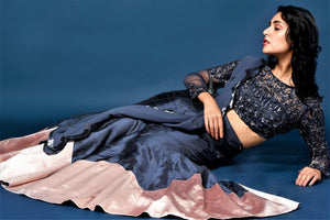 Buy classy dark blue raw silk lehenga with embroidered blouse online in USA and dupatta. Elevate your ethnic style with a stunning variety of designer dresses from Pure Elegance Indian clothing store in USA, Get your hands on a range of exquisite designer lehengas, wedding sarees, Anarkali suits also available at our online store.-side view