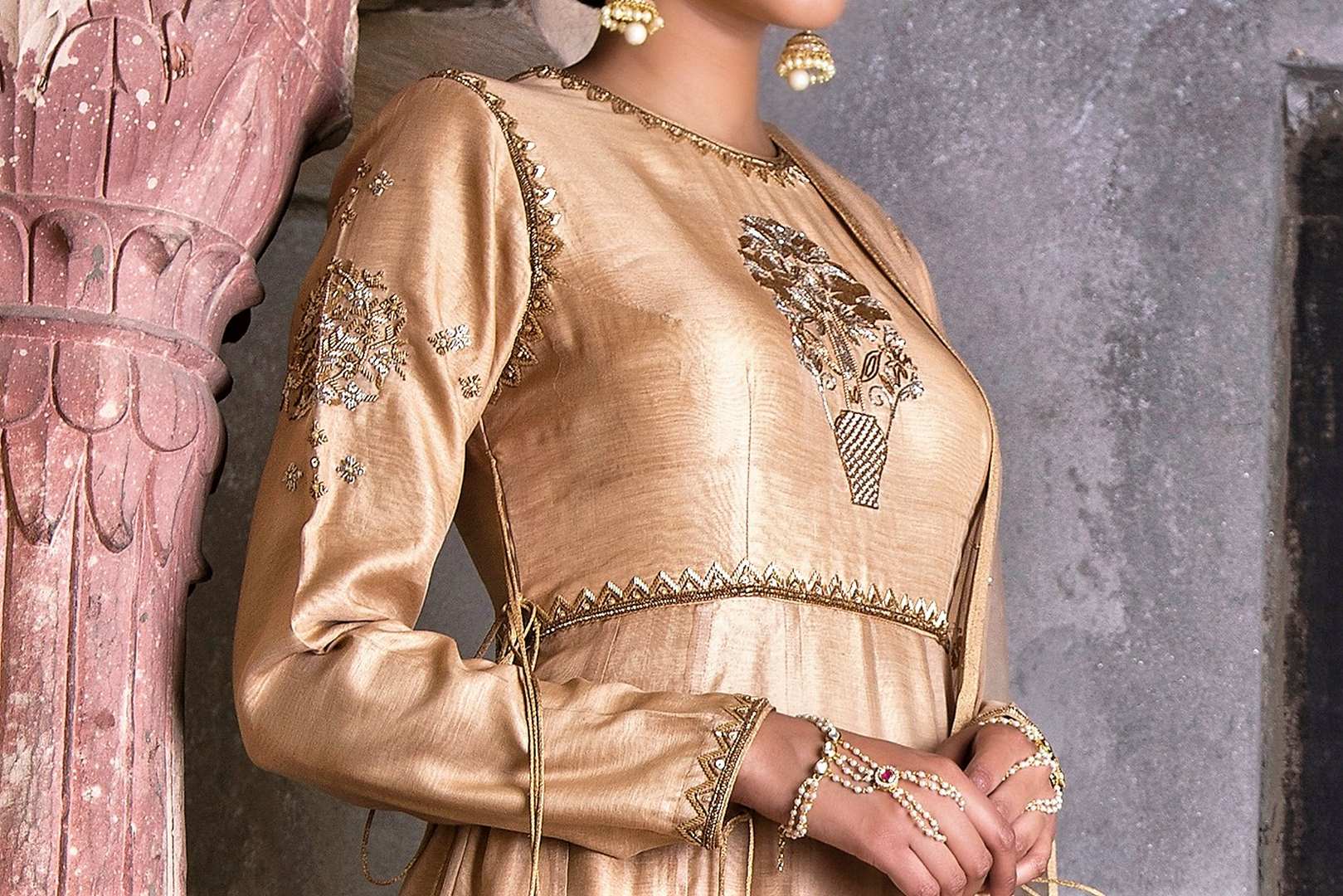 Buy beige color embroidered chanderi kurta with skirt online in USA and dupatta. Find a range of best Indian dresses for brides in USA at Pure Elegance clothing store. Enrich your traditional style with a range of Indian clothing, designer Anarkali suits, wedding lehengas, and much more also available at our online store.-kurta