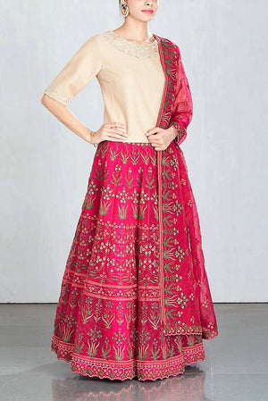 Buy beige and rani pink embroidered lehenga with dupatta online in USA. Make a captivating fashion statement with a range of Indian designer dresses from Pure Elegance clothing store in USA. If you are looking for online shopping, then look to our online store for a stunning collection of designer lehengas, Indian clothing and much more.-side