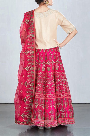 Buy beige and rani pink embroidered lehenga with dupatta online in USA. Make a captivating fashion statement with a range of Indian designer dresses from Pure Elegance clothing store in USA. If you are looking for online shopping, then look to our online store for a stunning collection of designer lehengas, Indian clothing and much more.-back