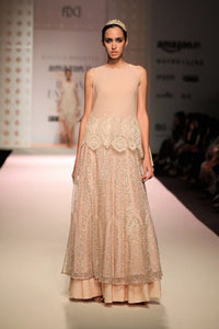 Shop beige color cutwork high low top with skirt online in USA. Make a captivating fashion statement with a range of Indian designer dresses from Pure Elegance clothing store in USA. If you are looking for online shopping, then look to our online store for a stunning collection of designer lehengas, Indian clothing and much more.-full view\