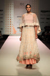 Buy beige color embroidered cape with high low skirt online in USA. Make a captivating fashion statement with a range of Indian designer dresses from Pure Elegance clothing store in USA. If you are looking for online shopping, then look to our online store for a stunning collection of designer lehengas, Indian clothing and much more.-full view