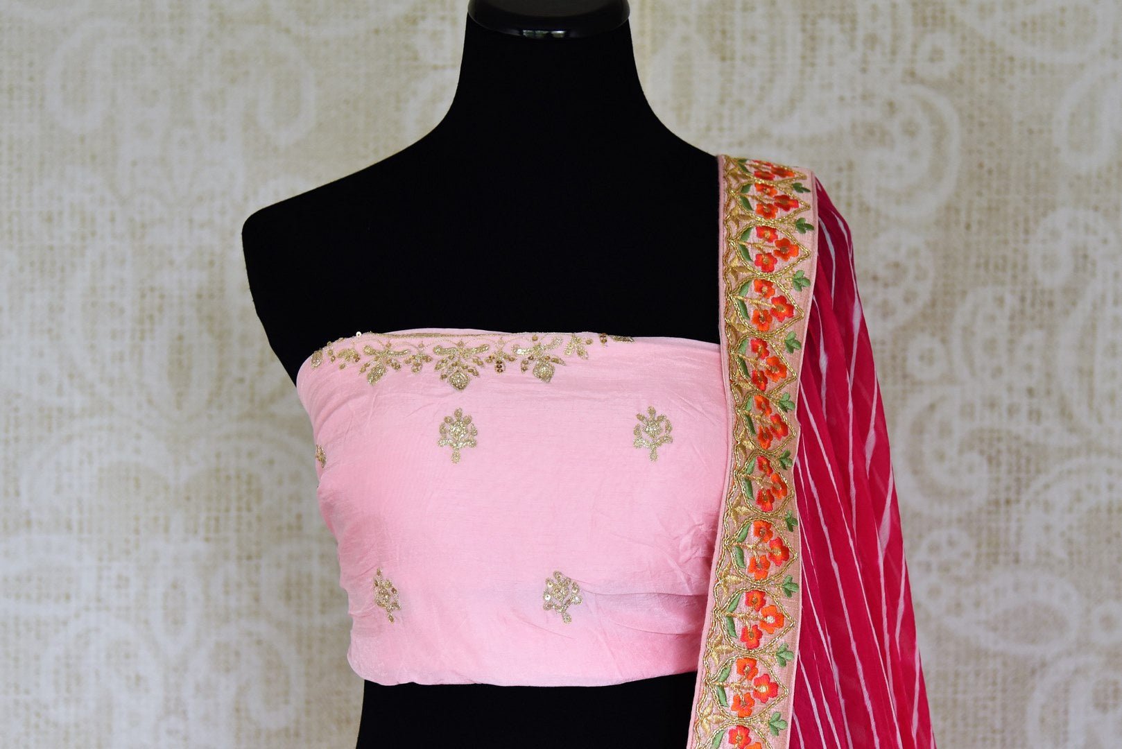 Shop beautiful designer pink ikkat lehenga online in USA with pink dupatta. Get ready to dazzle on weddings and special occasions with an exquisite variety of Indian designer clothes from Pure Elegance Indian clothing store in USA. We have a splendid collection of bridal lehengas, designer sarees, Anarkali suits to make your look absolutely one of kind.-front