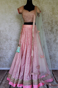Buy beautiful blush pink embroidered chanderi silk lehenga online in USA with dupatta. Get ready to dazzle on weddings and special occasions with an exquisite variety of Indian designer clothes from Pure Elegance Indian clothing store in USA. We have a splendid collection of bridal lehengas, designer sarees, Anarkali suits to make your look absolutely one of kind.-full view