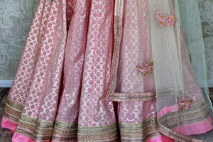 Buy beautiful blush pink embroidered chanderi silk lehenga online in USA with dupatta. Get ready to dazzle on weddings and special occasions with an exquisite variety of Indian designer clothes from Pure Elegance Indian clothing store in USA. We have a splendid collection of bridal lehengas, designer sarees, Anarkali suits to make your look absolutely one of kind.-bottom