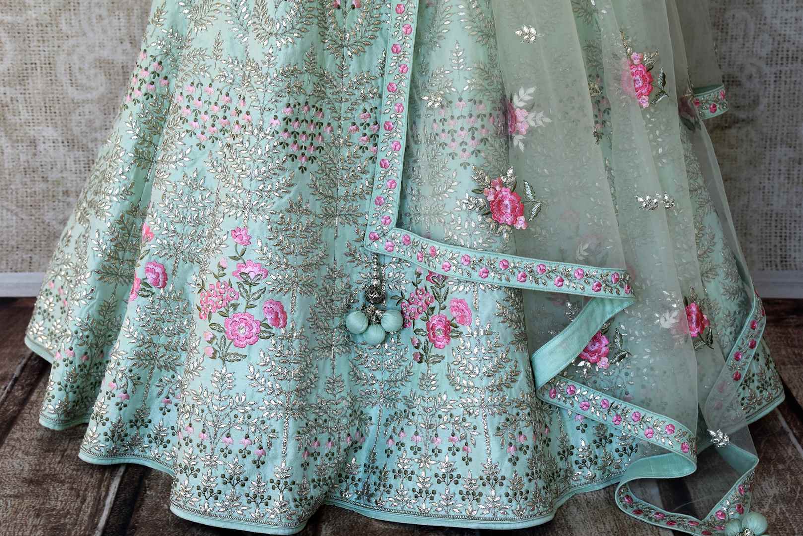 Buy mint green gota patti silk lehenga online in USA with dupatta. Update your saree wardrobe with stunning Indian designer clothing from Pure Elegance Indian fashion store in USA. Shop now.-bottom