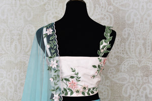Buy blue and white floral embroidered designer lehenga online in USA with dupatta. Pick your favorite Indian clothing from a colorful collection available at Pure Elegance Indian fashion store in USA. We have an alluring range of wedding lehengas, designer Anarkali suits, gowns for Indian women in USA.-blouse back