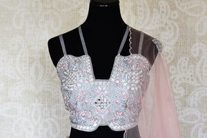 Shop pink and grey floral embroidered silk lehenga online in USA with net overlay and dupatta. Keep your wardrobe update with latest Indian designer clothese from Pure Elegance Indian fashion store in USA. Shop traditional Anarkali suits, designer lehengas for Indian brides in USA from our online store.-front