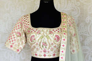 Buy pink and cream embroidered chanderi silk lehenga online in USA with dupatta. Raise your ethnic style quotient at special occasions with exquisite Indian clothing from Pure Elegance Indian clothing store in USA. Pick from a tasteful collection of designer lehengas, Anarkali suits, Indian dresses. Shop now.-front
