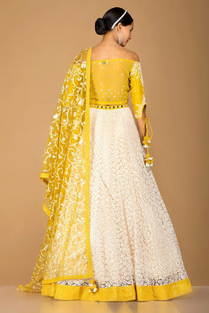 Shop beautiful yellow and white designer lehenga online in USA with dupatta. Gear up for the festive season with exquisite designer lehengas, Anarkali suits. Indian dresses from Pure Elegance Indian fashion store in USA. Shop online now.-back