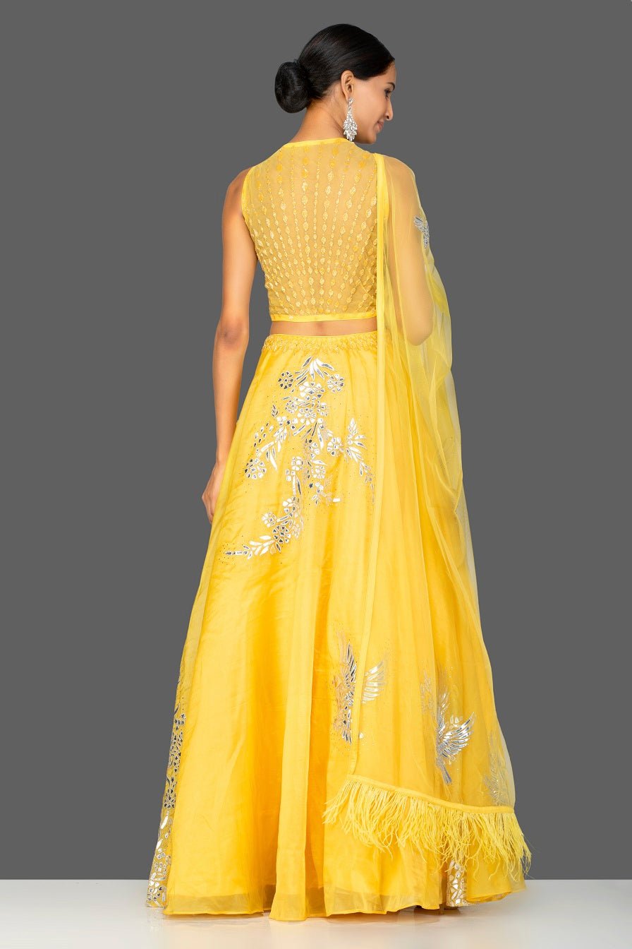 Shop lovely yellow applique work designer lehenga online in USA with dupatta. Gear up for the festive season with exquisite designer lehengas, Anarkali suits. Indian dresses from Pure Elegance Indian fashion store in USA. Shop online now.-back