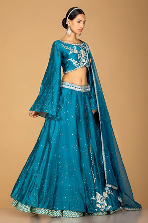 Buy exquisite blue embroidered designer lehenga online in USA with dupatta. Gear up for the festive season with exquisite designer lehengas, Anarkali suits. Indian dresses from Pure Elegance Indian fashion store in USA. Shop online now.-side