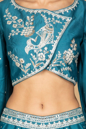 Buy exquisite blue embroidered designer lehenga online in USA with dupatta. Gear up for the festive season with exquisite designer lehengas, Anarkali suits. Indian dresses from Pure Elegance Indian fashion store in USA. Shop online now.-closeup