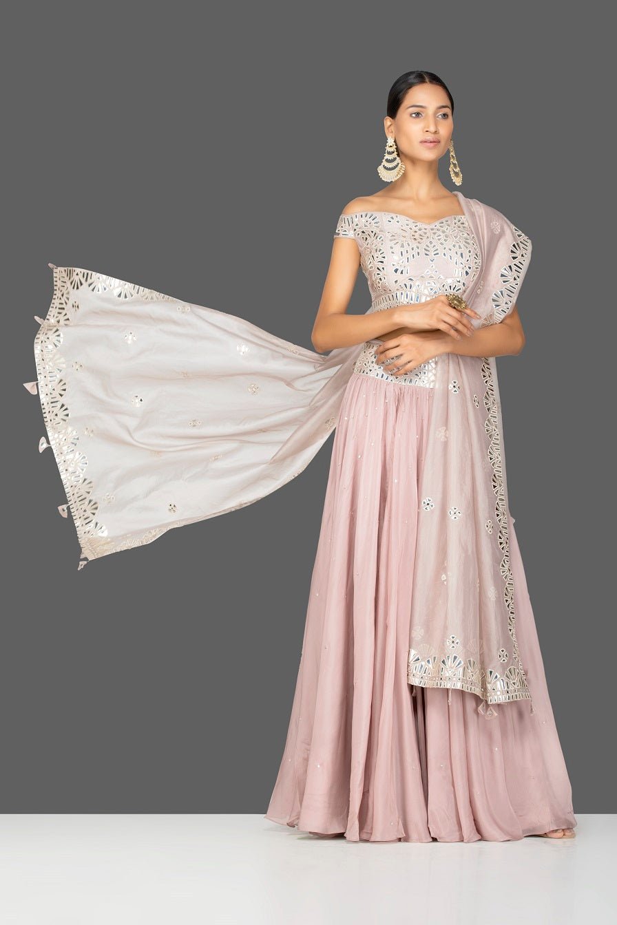 Buy beautiful nude pink applique work georgette lehenga online in USA with dupatta. Gear up for the festive season with exquisite designer lehengas, Anarkali suits. Indian dresses from Pure Elegance Indian fashion store in USA. Shop online now.-front