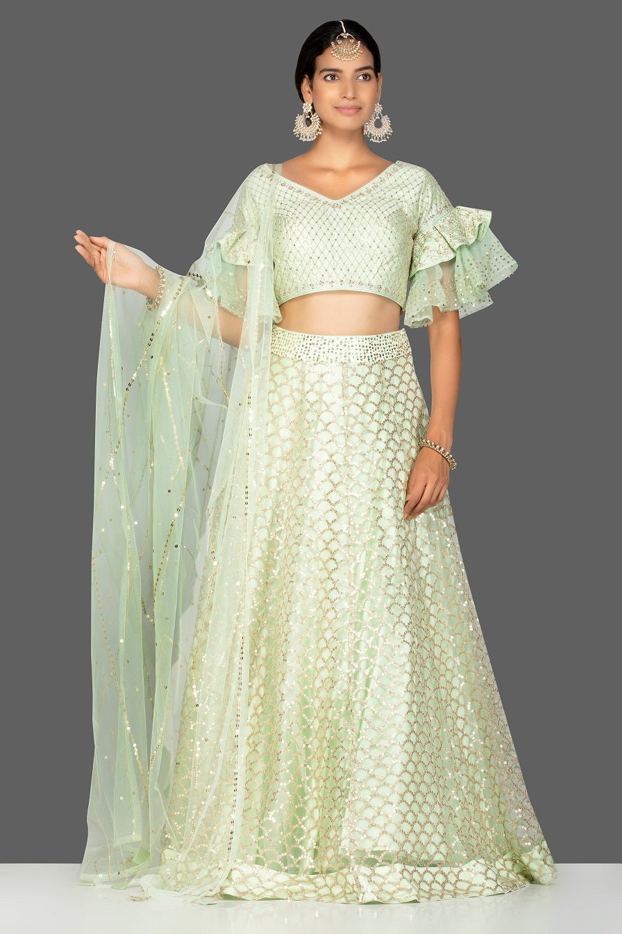Shop beautiful mint green embroidered net lehenga online in USA with dupatta. Gear up for the festive season with exquisite designer lehengas, Anarkali suits. Indian dresses from Pure Elegance Indian fashion store in USA. Shop online now.-front