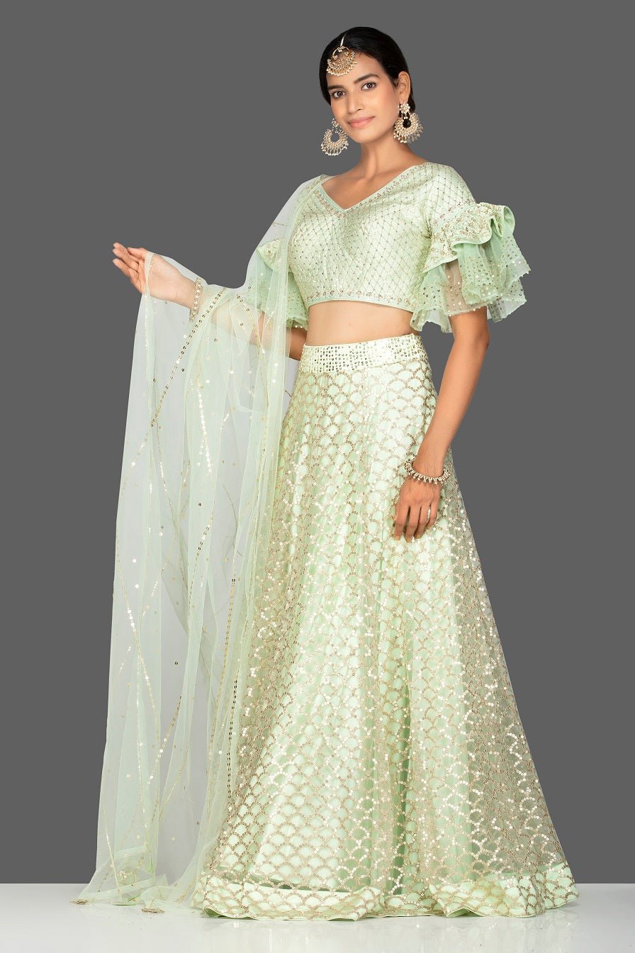 Shop beautiful mint green embroidered net lehenga online in USA with dupatta. Gear up for the festive season with exquisite designer lehengas, Anarkali suits. Indian dresses from Pure Elegance Indian fashion store in USA. Shop online now.-full view