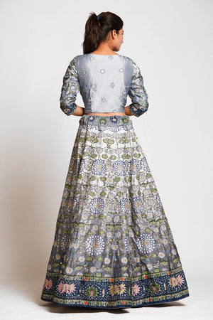 Shop stunning grey printed embroidered silk lehenga online in USA with dupatta. Elevate your traditional Indian style with exquisite designer lehengas, Anarkali suits, traditional salwar suits from Pure Elegance Indian clothing store in USA.-back