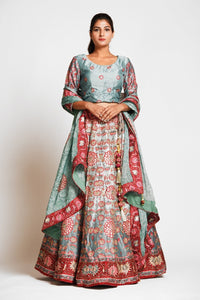 Buy gorgeous mint green printed embroidered silk lehenga online in USA with dupatta. Elevate your traditional Indian style with exquisite designer lehengas, Anarkali suits, traditional salwar suits from Pure Elegance Indian clothing store in USA.-front