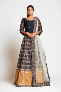 Buy beautiful black embroidered silk lehenga online in USA with mustard border and white net dupatta. Elevate your traditional Indian style with exquisite designer lehengas, Anarkali suits, traditional salwar suits from Pure Elegance Indian clothing store in USA.-full view