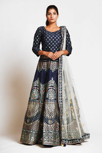 Buy navy blue embroidered designer silk lehenga online in USA with white net dupatta. Elevate your traditional Indian style with exquisite designer lehengas, Anarkali suits, traditional salwar suits from Pure Elegance Indian clothing store in USA.-full view