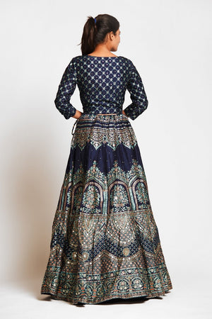 Buy navy blue embroidered designer silk lehenga online in USA with white net dupatta. Elevate your traditional Indian style with exquisite designer lehengas, Anarkali suits, traditional salwar suits from Pure Elegance Indian clothing store in USA.-back