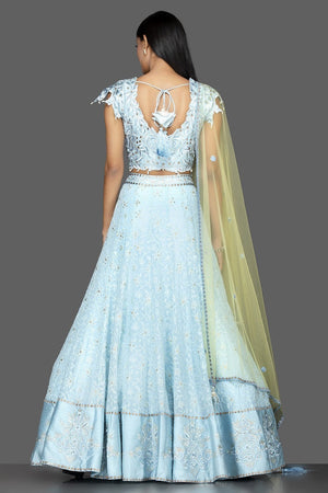 Shop sky blue stone and Lucknowi work georgette lehenga online in USA with green net dupatta. Spread ethnic elegance on weddings and special occasions in splendid designer lehengas, Indowestern dresses crafted with exquisite Indian craftsmanship from Pure Elegance Indian fashion store in USA.-back