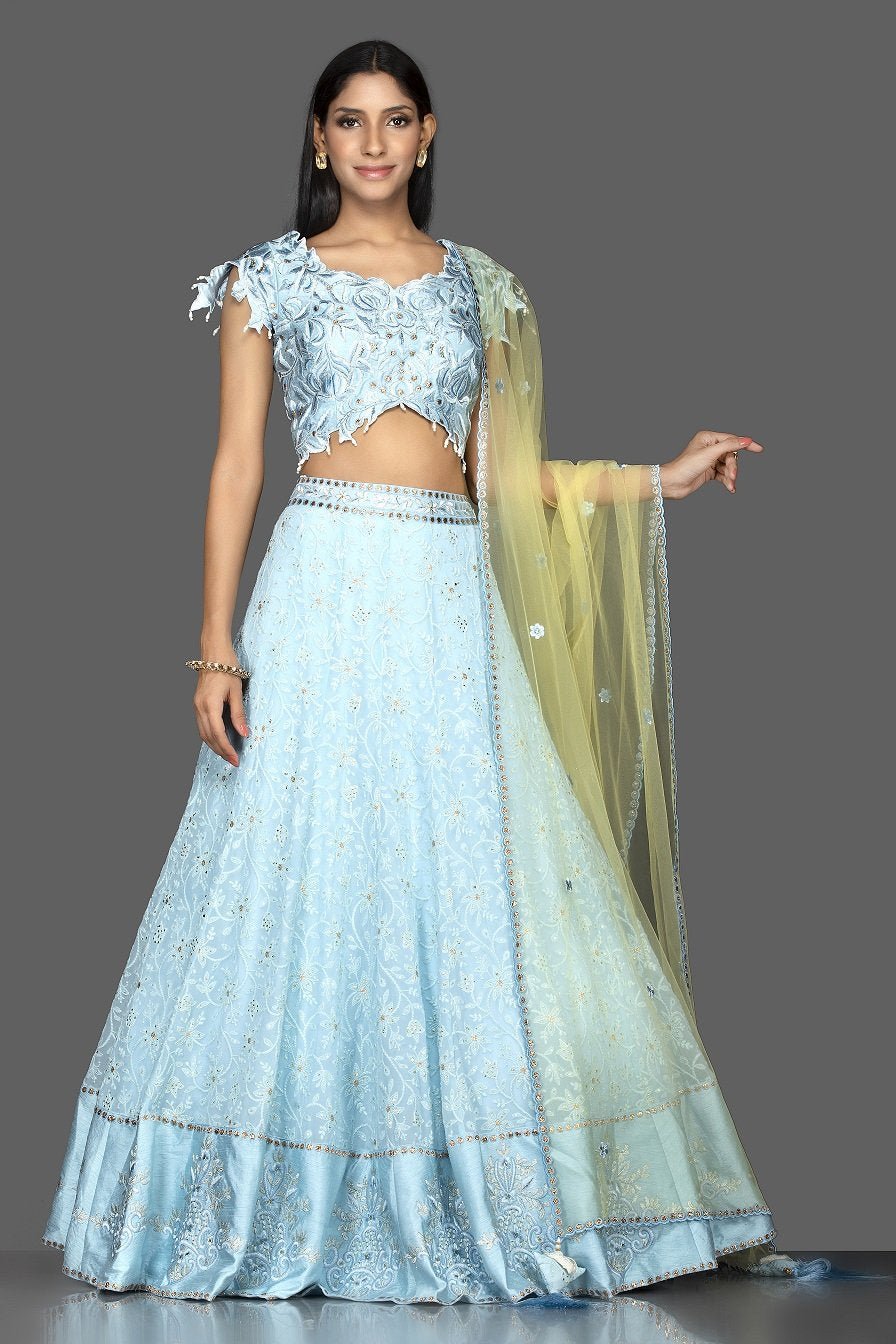 Shop sky blue stone and Lucknowi work georgette lehenga online in USA with green net dupatta. Spread ethnic elegance on weddings and special occasions in splendid designer lehengas, Indowestern dresses crafted with exquisite Indian craftsmanship from Pure Elegance Indian fashion store in USA.-front
