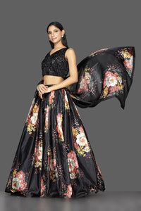 Shop ravishing black embroidered organza floral print lehenga online in USA with matching dupatta. Spread ethnic elegance on weddings and special occasions in splendid designer lehengas, Indowestern dresses crafted with exquisite Indian craftsmanship from Pure Elegance Indian fashion store in USA.-full view