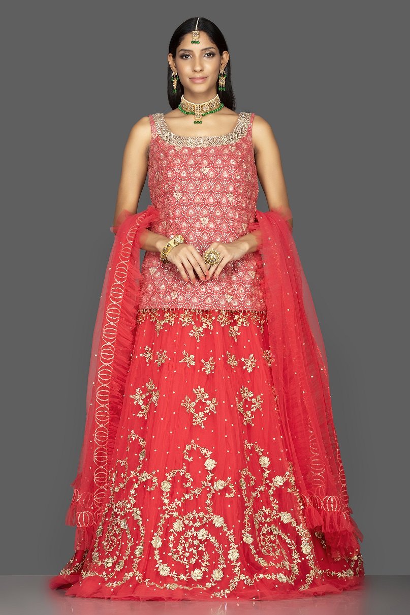 Buy gorgeous red embroidered lehenga online in USA. Look radiant on weddings and special occasions in splendid designer lehengas crafted with finest embroideries and stunning silhouettes from Pure Elegance Indian fashion boutique in USA.-full view