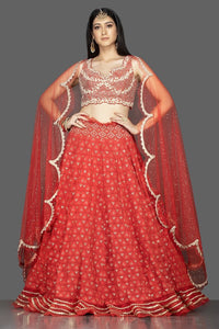 Buy gorgeous red Lucknowi work georgette lehenga online in USA with net dupatta. Look radiant on weddings and special occasions in splendid designer lehengas crafted with finest embroideries and stunning silhouettes from Pure Elegance Indian fashion boutique in USA.-full view